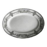Plat ovale ancien en faïence, décor néoclassique noir et blanc