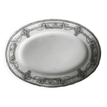 Plat ovale ancien en faïence, décor néoclassique noir et blanc