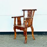 Fauteuil en teck poignardé à la main