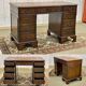English mahogany pedestal desk with leather top from the 1950s