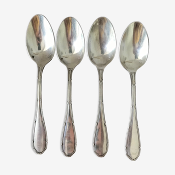 Set of 4 teaspoons made of silver metal