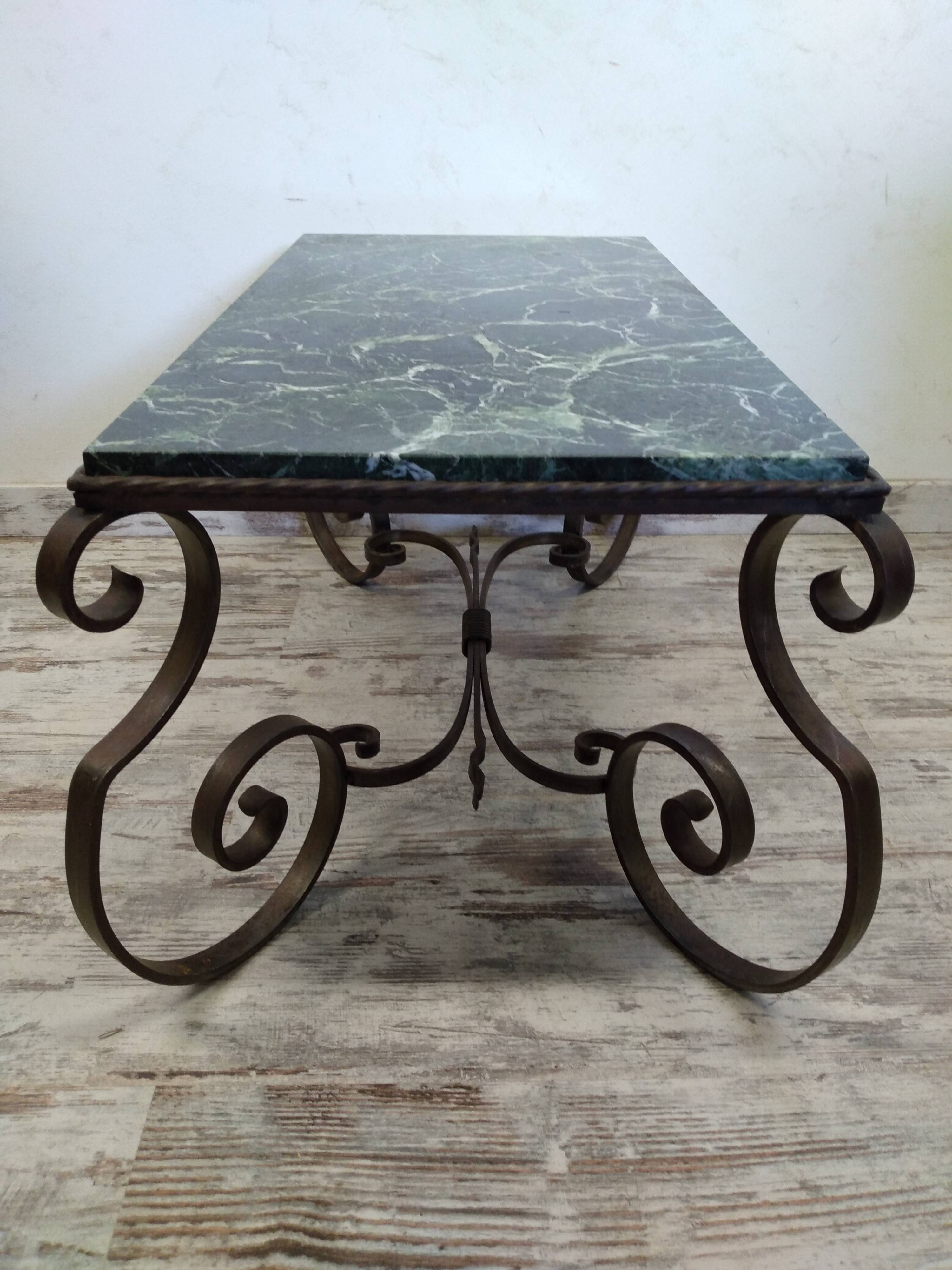 Wrought iron and marble coffee table