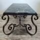 Wrought iron and marble coffee table