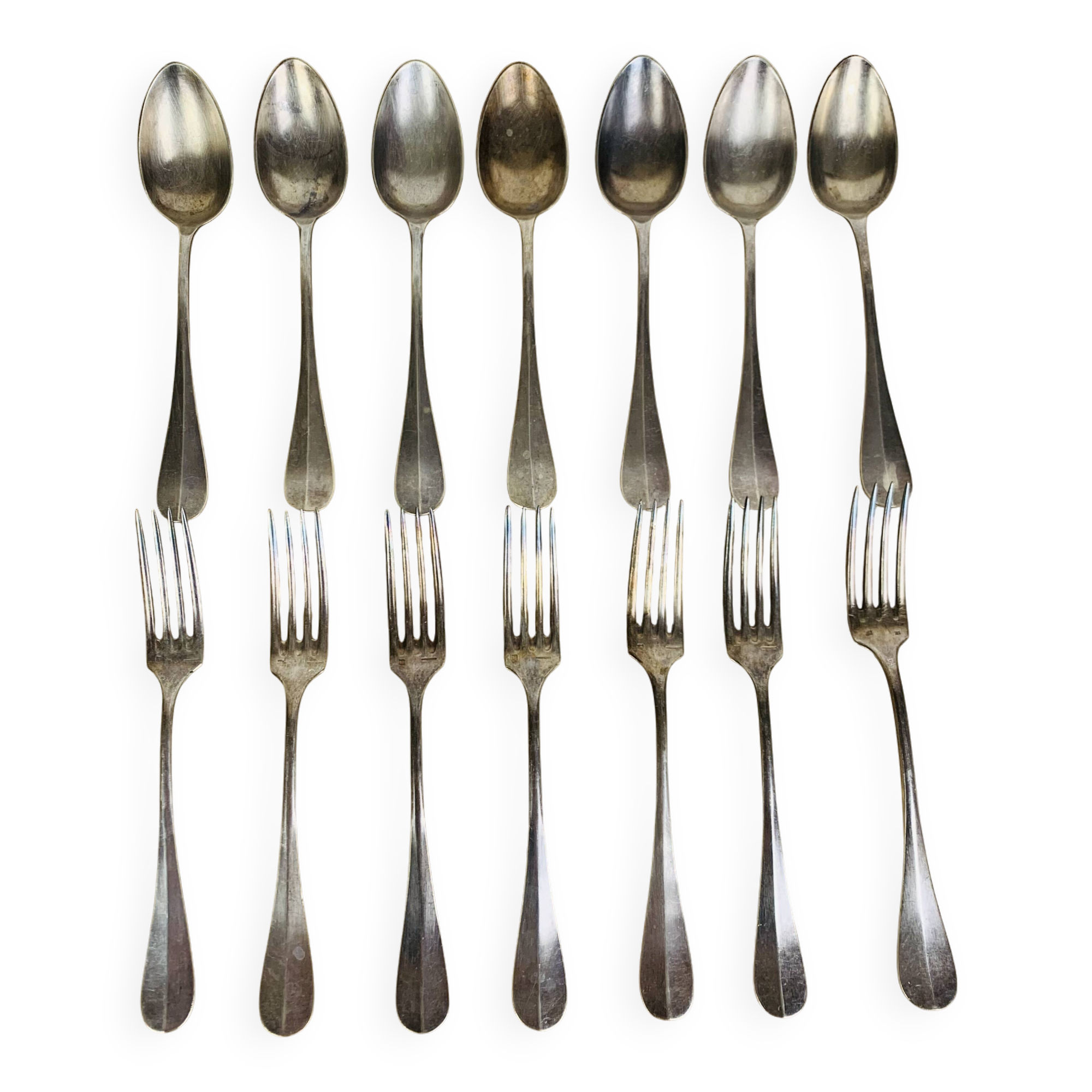7 vintage silver plated forks and 7 spoons