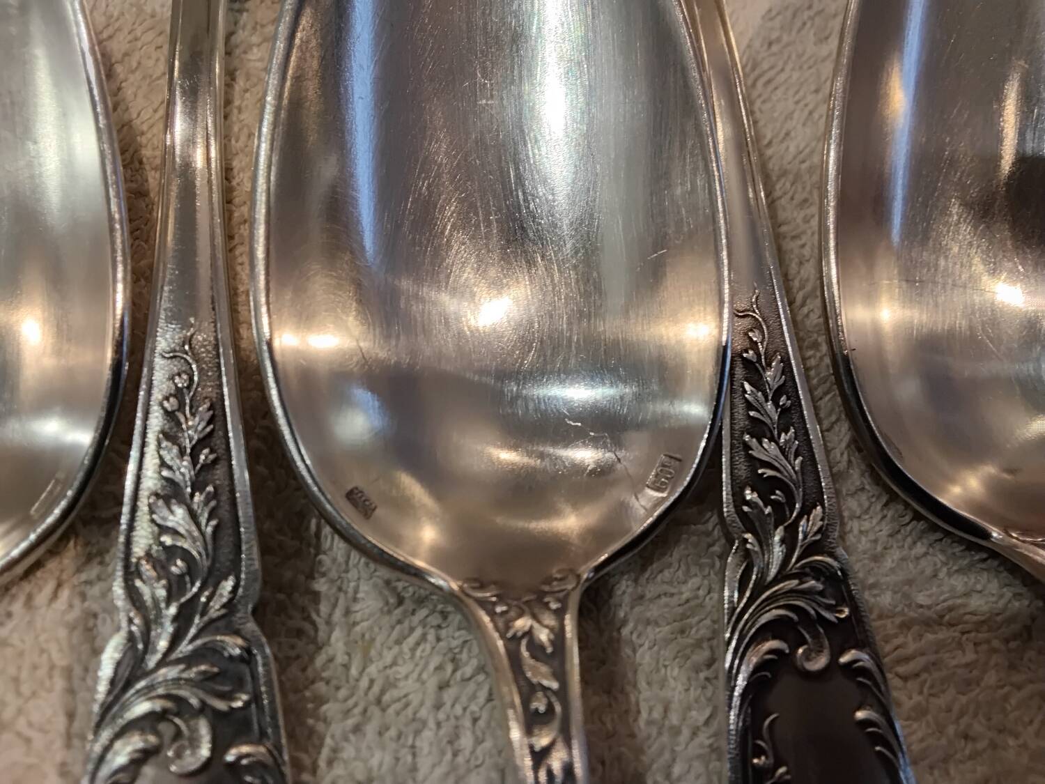 12 silver-plated metal dessert spoons, silversmith SFAM, rocaille design, 19.1 cm.