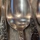 12 silver-plated metal dessert spoons, silversmith SFAM, rocaille design, 19.1 cm.