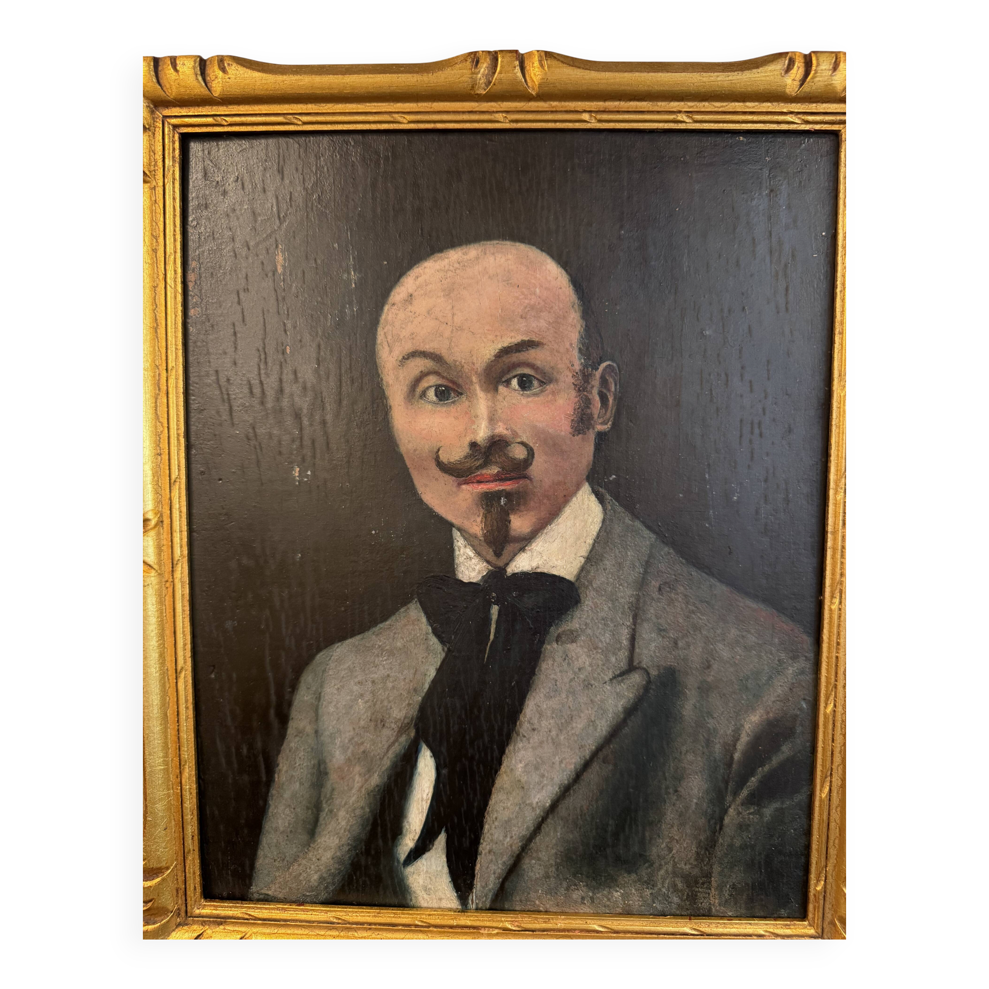 Portrait of a dandy with a moustache from the early 20th century.
