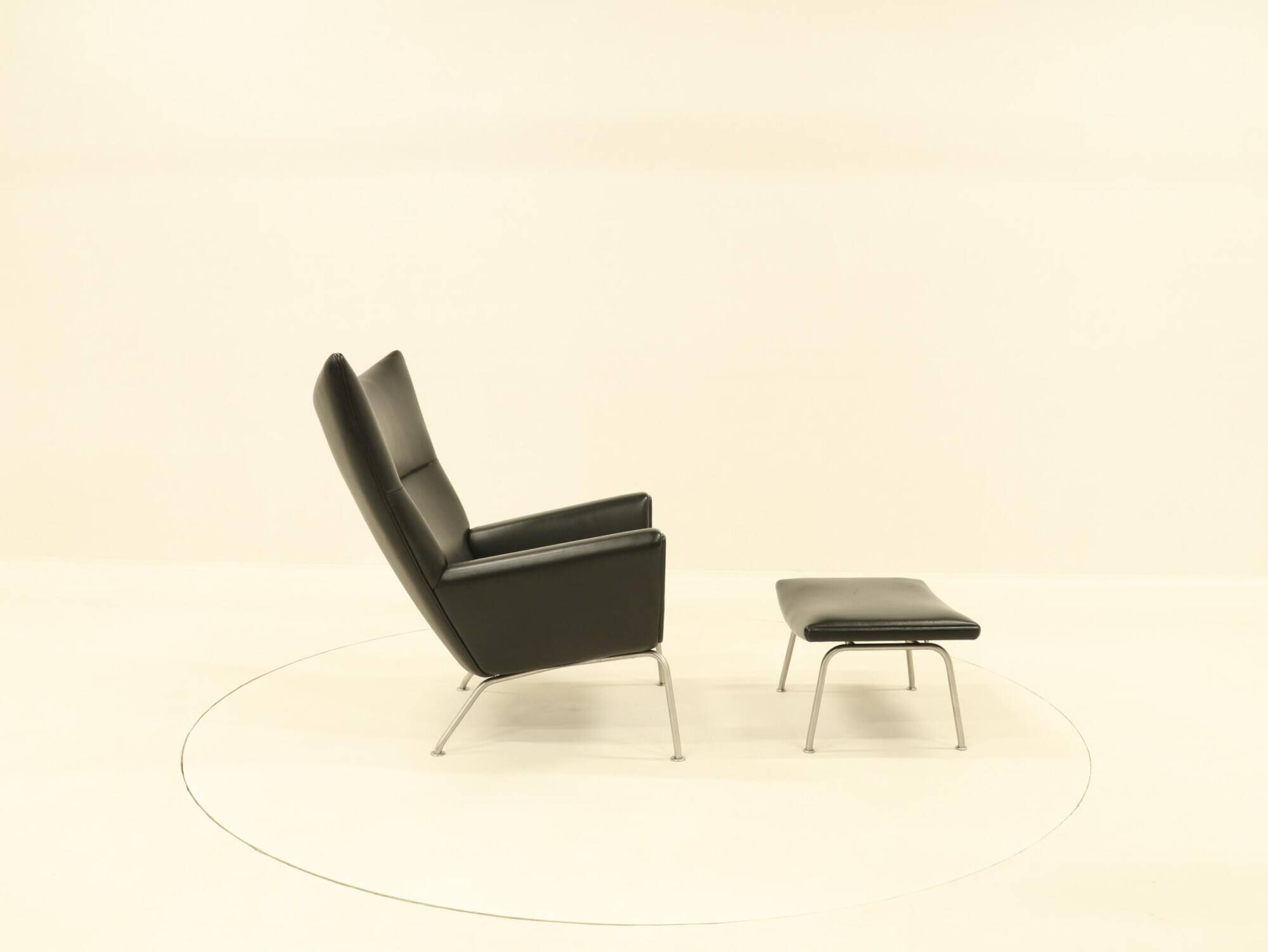 Wing chair & matching ottoman – CH445 & CH446 – by Hans Wegner