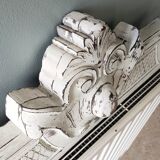 Old pediment in painted wood