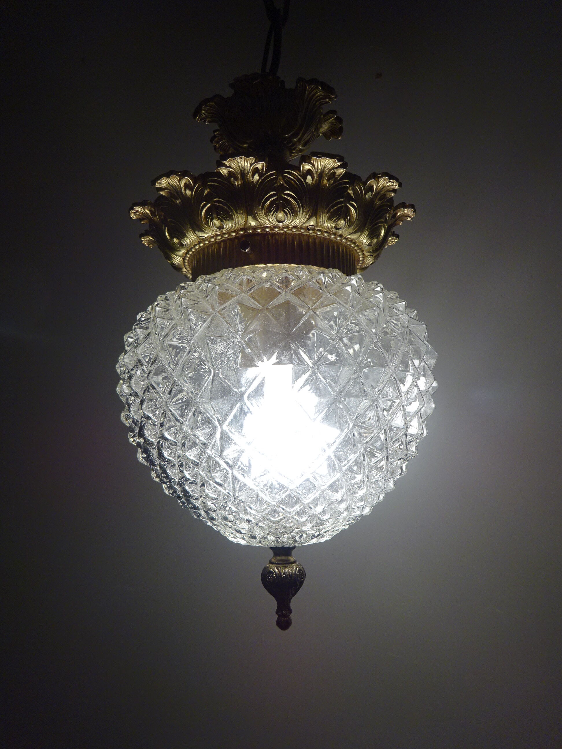 Glass and brass globe chandelier