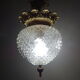 Glass and brass globe chandelier