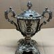 A lovely Regency-style silver mustard pot from the 19th century.