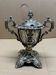 A lovely Regency-style silver mustard pot from the 19th century.