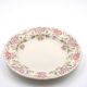 Antique Longchamp service shallow dish with polychrome daisies, ironstone, 19th century.