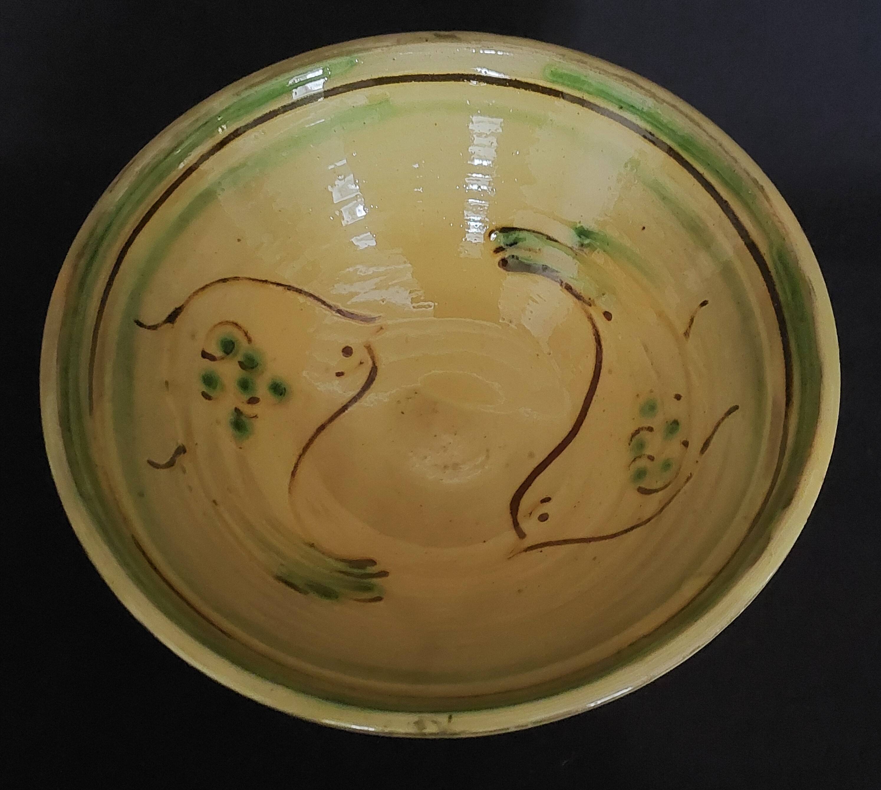 Glazed terracotta bowl dish with 20th century bird decoration