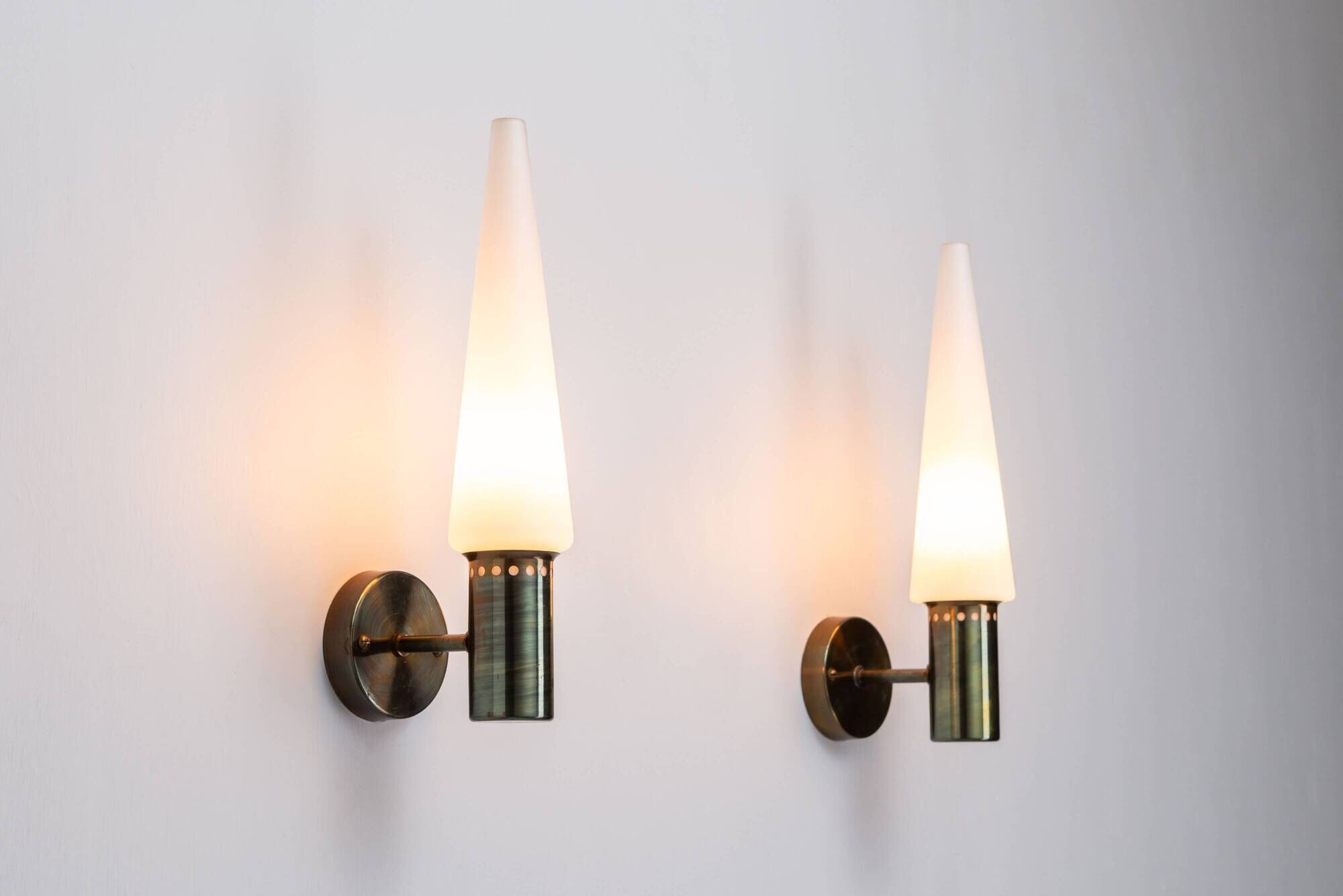 Set of two Hans Agne Jakobsson wall lamps with opal glass shades