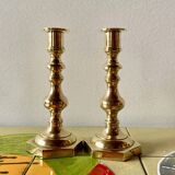 Pair of old brass candlesticks