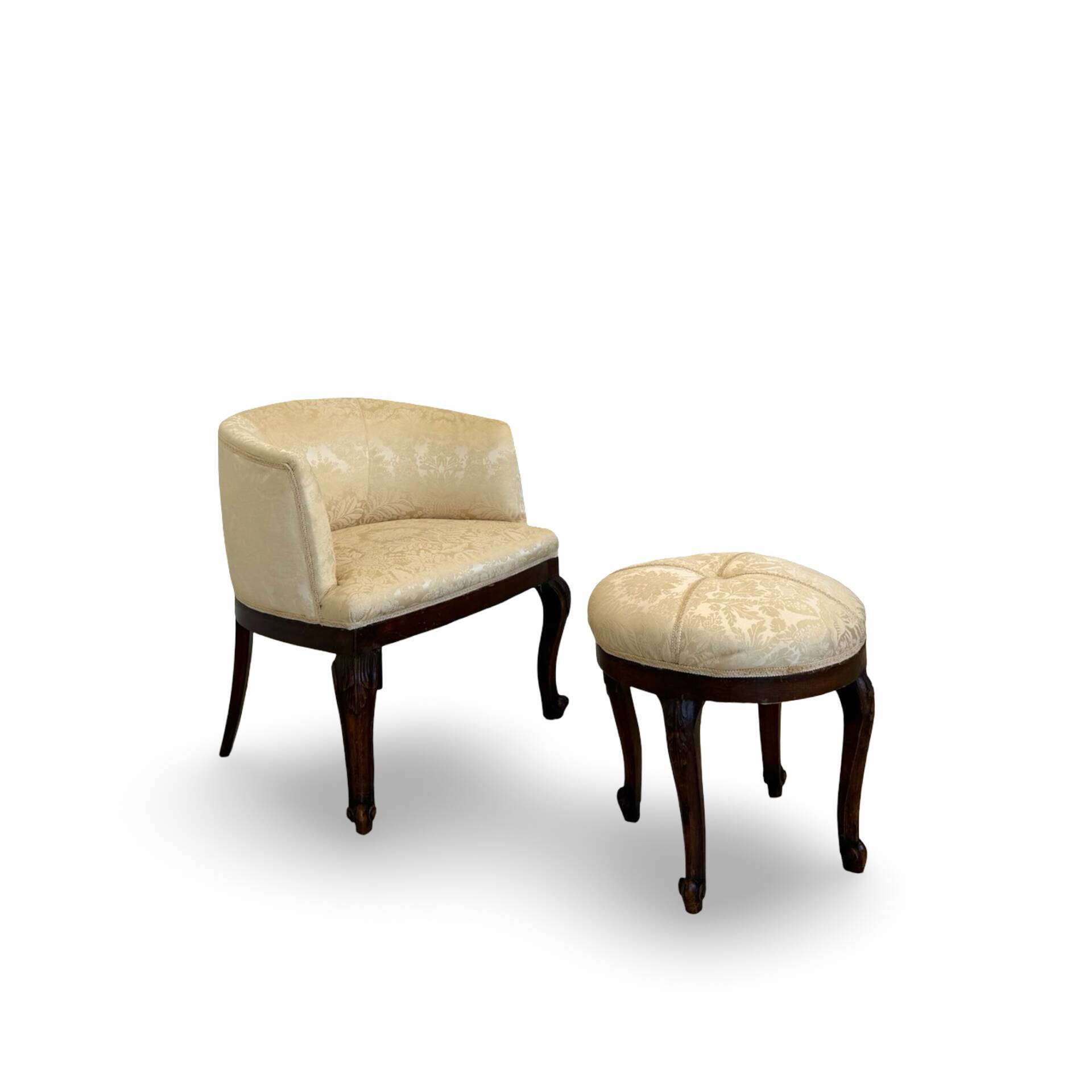 An antique Italian bar chair and a matching tufted vanity stool.