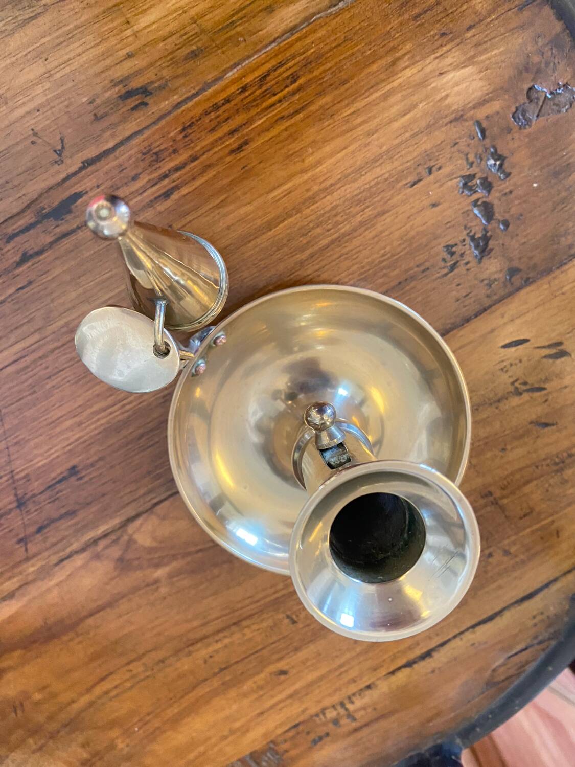 Brass candle holder with snuffer