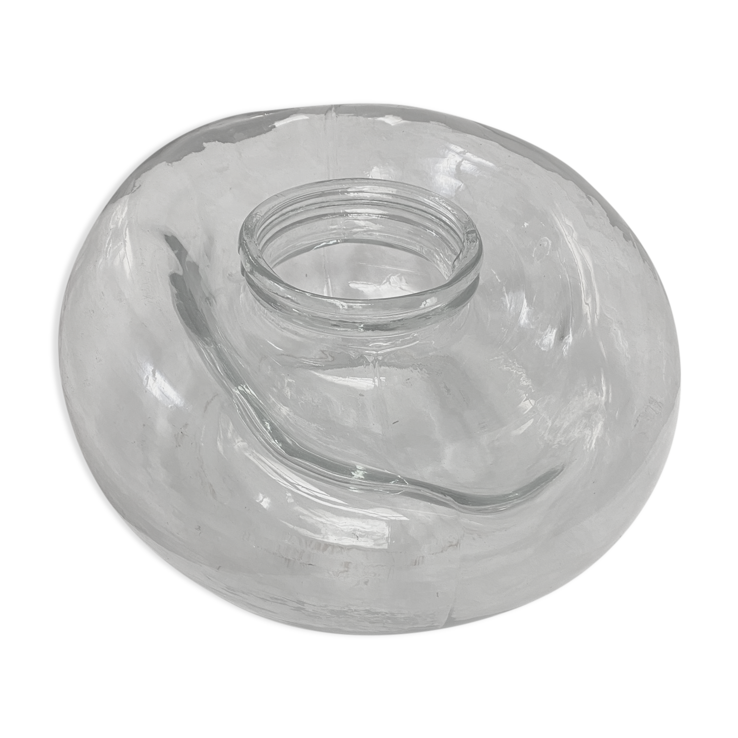 Old jar made of deformed glass