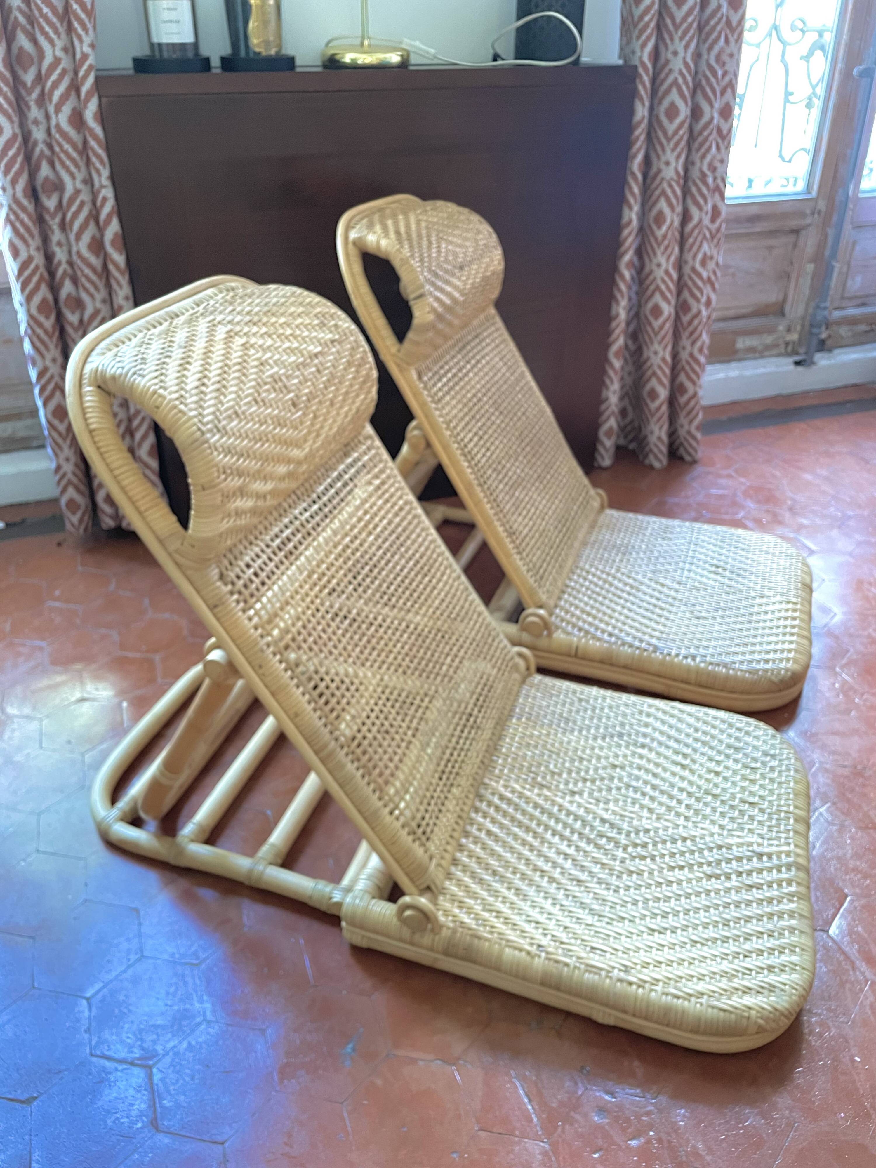Paire de fauteuils pliables  en rotin