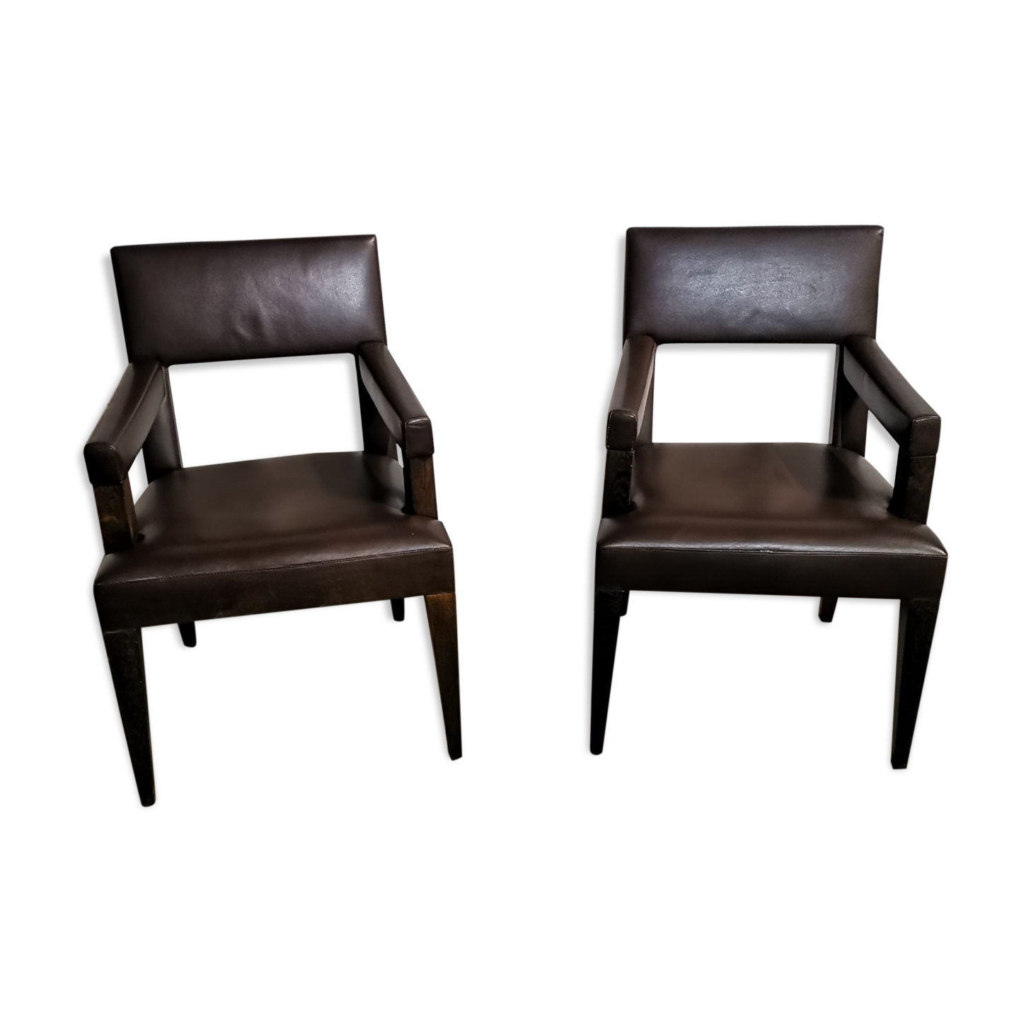 pair of leather armchairs (French cow) by Michel Hurel