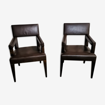 pair of leather armchairs (French cow) by Michel Hurel