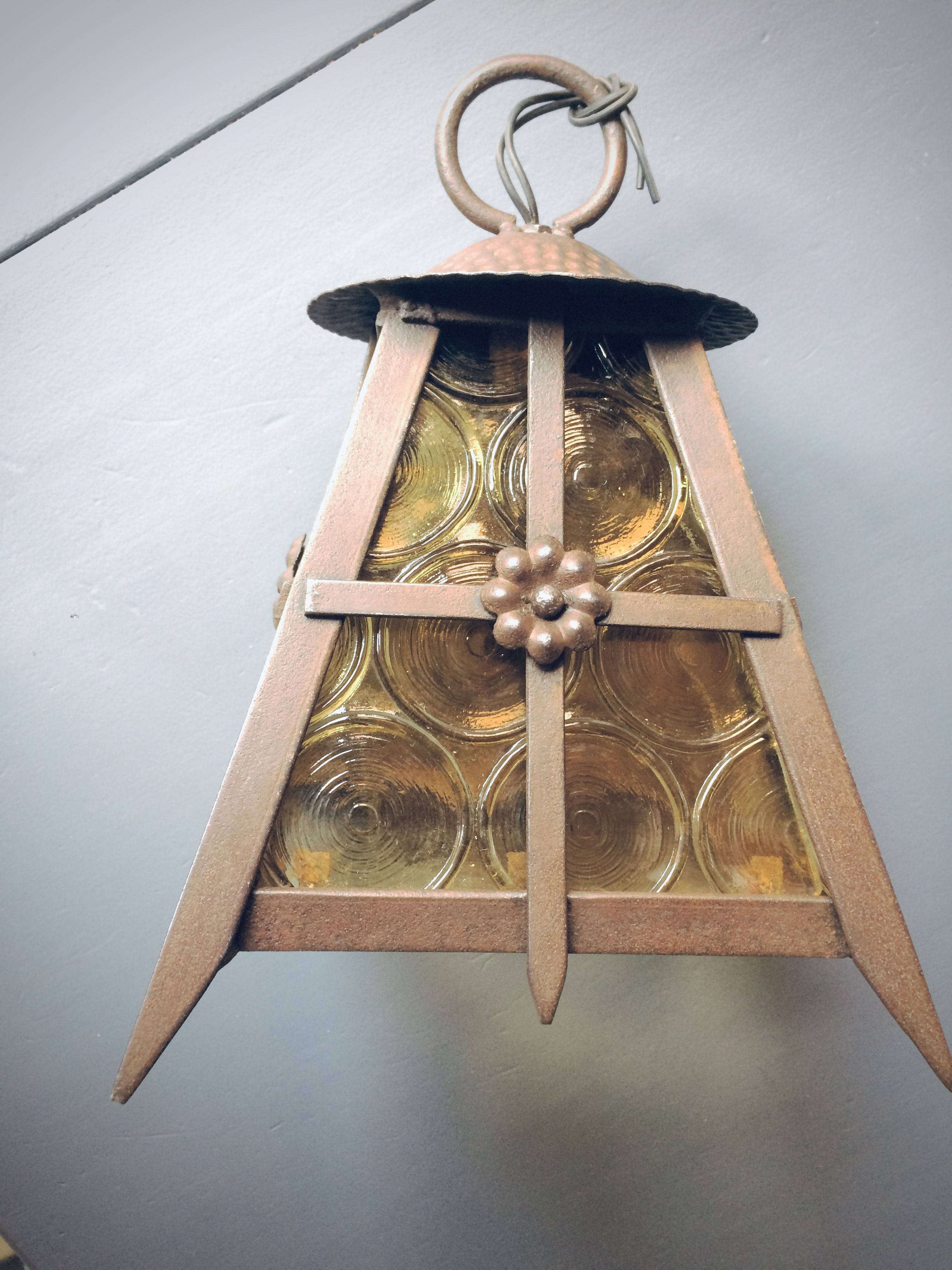 Old solid steel hanging and round-ornamented yellow glazing