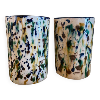 Pair of multi-colored enameled pot covers