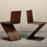 Gerrit Rietveld Zig Zag Chair is dark brown stained wood