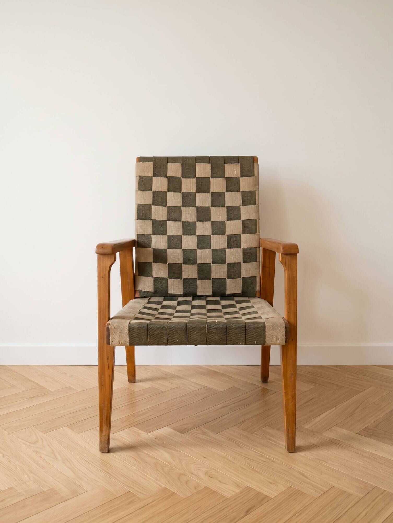 Vintage Scandinavian armchair in wood and woven strap.