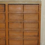 Industrial metal chest of drawers with 30 drawers.