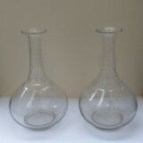 Pair of crystal decanters with cut collar and engraved body with R monograms