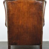 Especially comfortable wingback chair made of sheepskin leather, stunning colors