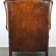 Fauteuil à oreilles particulièrement confortable en cuir de mouton, couleurs époustouflantes