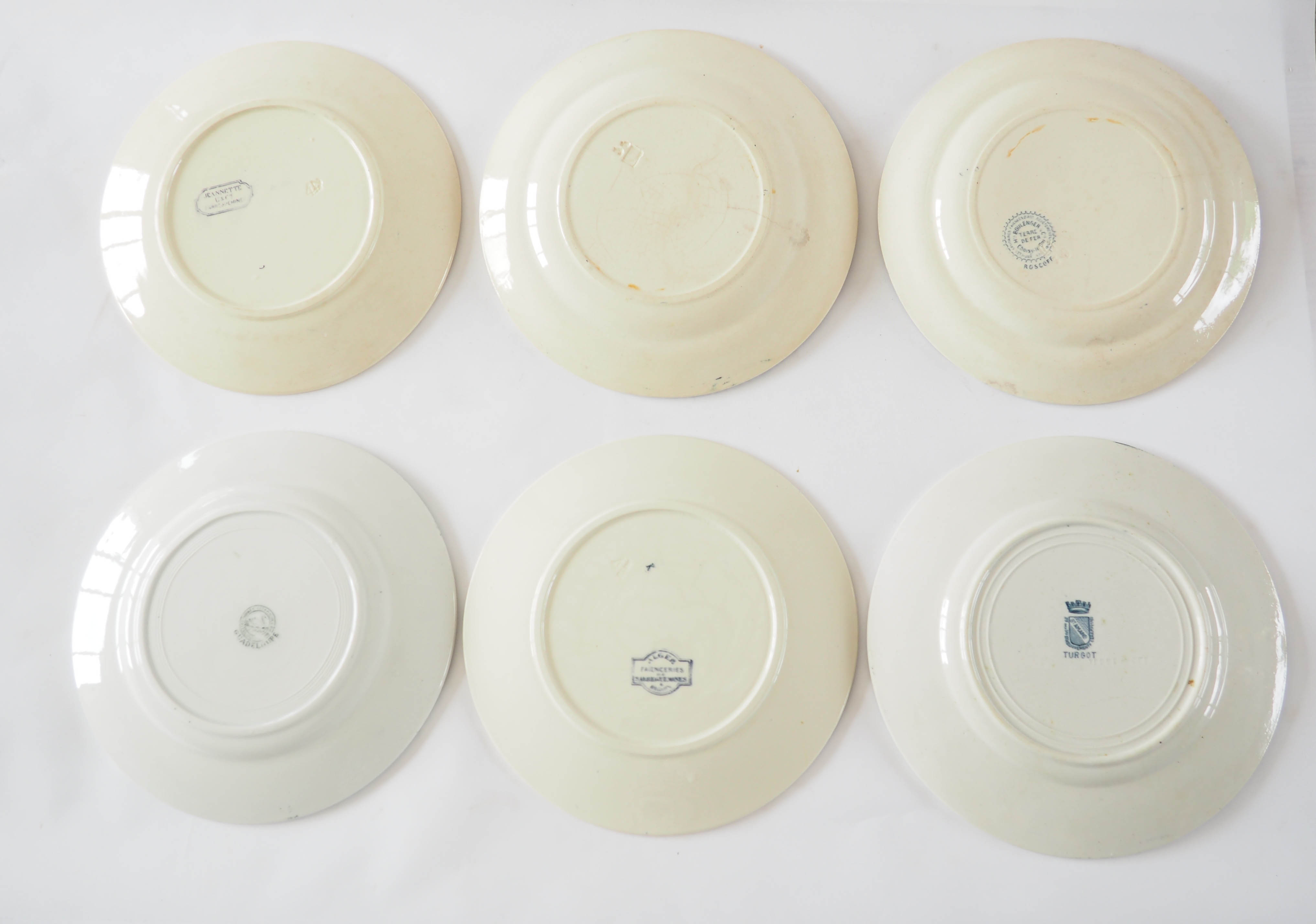 6 mismatched iron earth plates