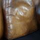 Club chair in patinated sheepskin