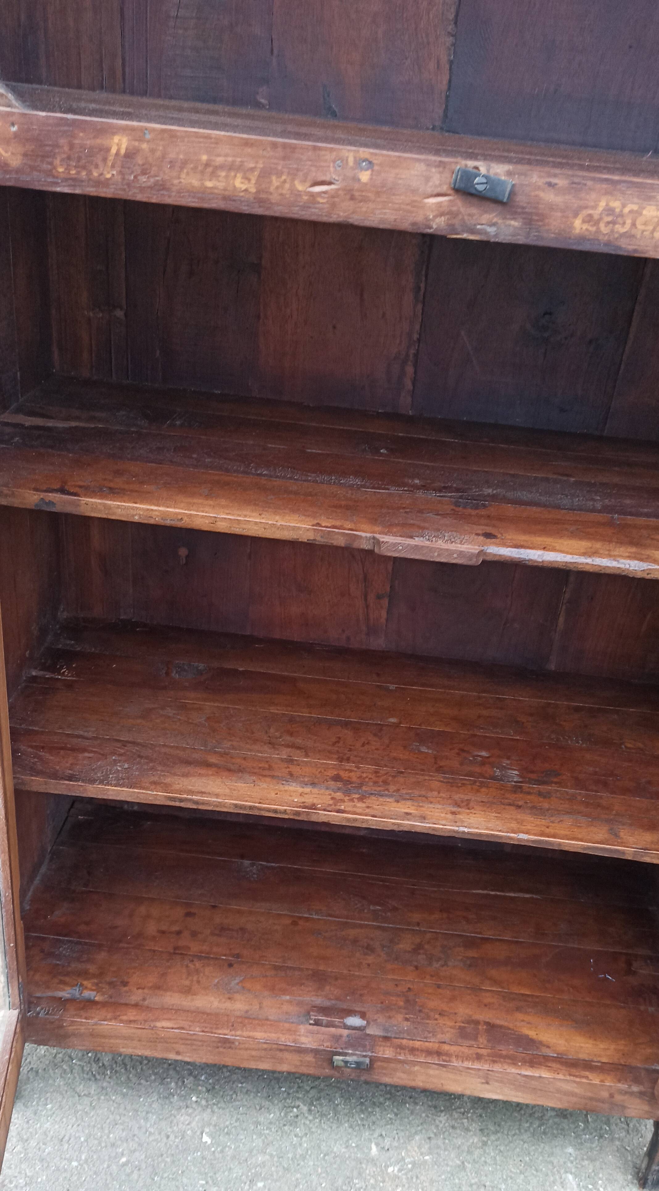 Small wooden glass cabinet with retractable door