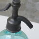 Turquoise blown and twisted glass siphon, Belle Epoque period, tin cap dated 1925, Boyer and Brush, Terre noire