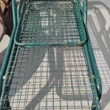 Pair of metal deckchairs