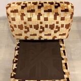 Vintage armchair from the 70s in beige and brown.