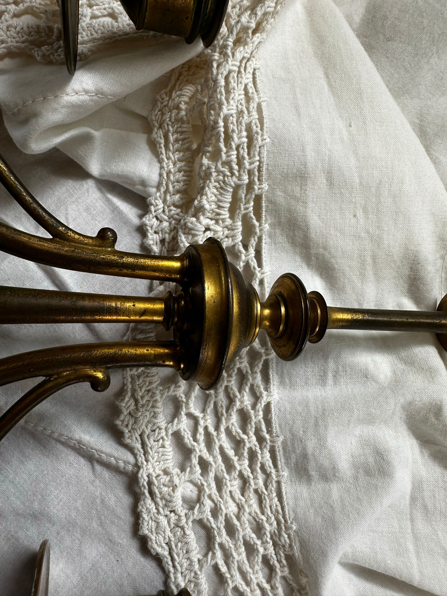 Pair of Empire style candlesticks, patinated brass and black stone.
