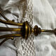 Pair of Empire style candlesticks, patinated brass and black stone.