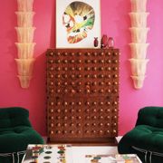 Italian brutalist-style bar made of wood and glass, drinks cabinet.