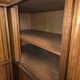Modular corner library Oscar from the 1960s with sliding doors.