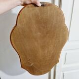 Free form mirror in golden wood