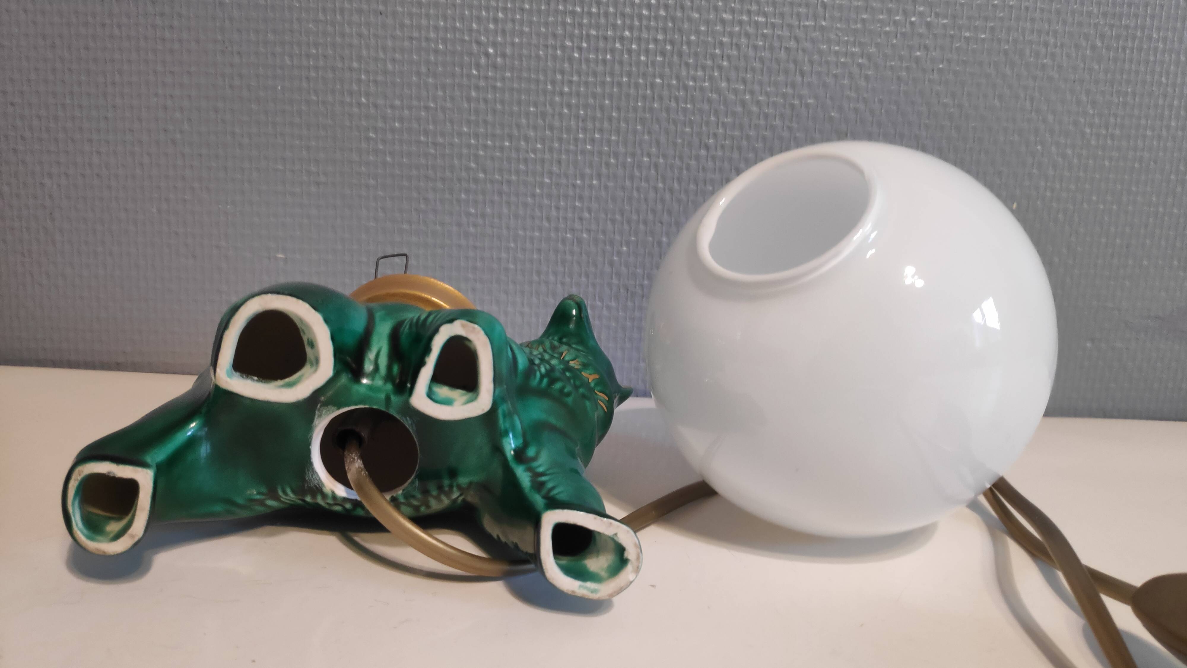 Green ceramic bear lamp and white opaline globe