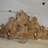 Pediment with patinated characters golden