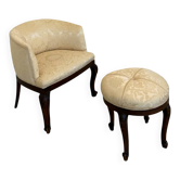 An Italian antique barrel chair and a matching tufted vanity stool