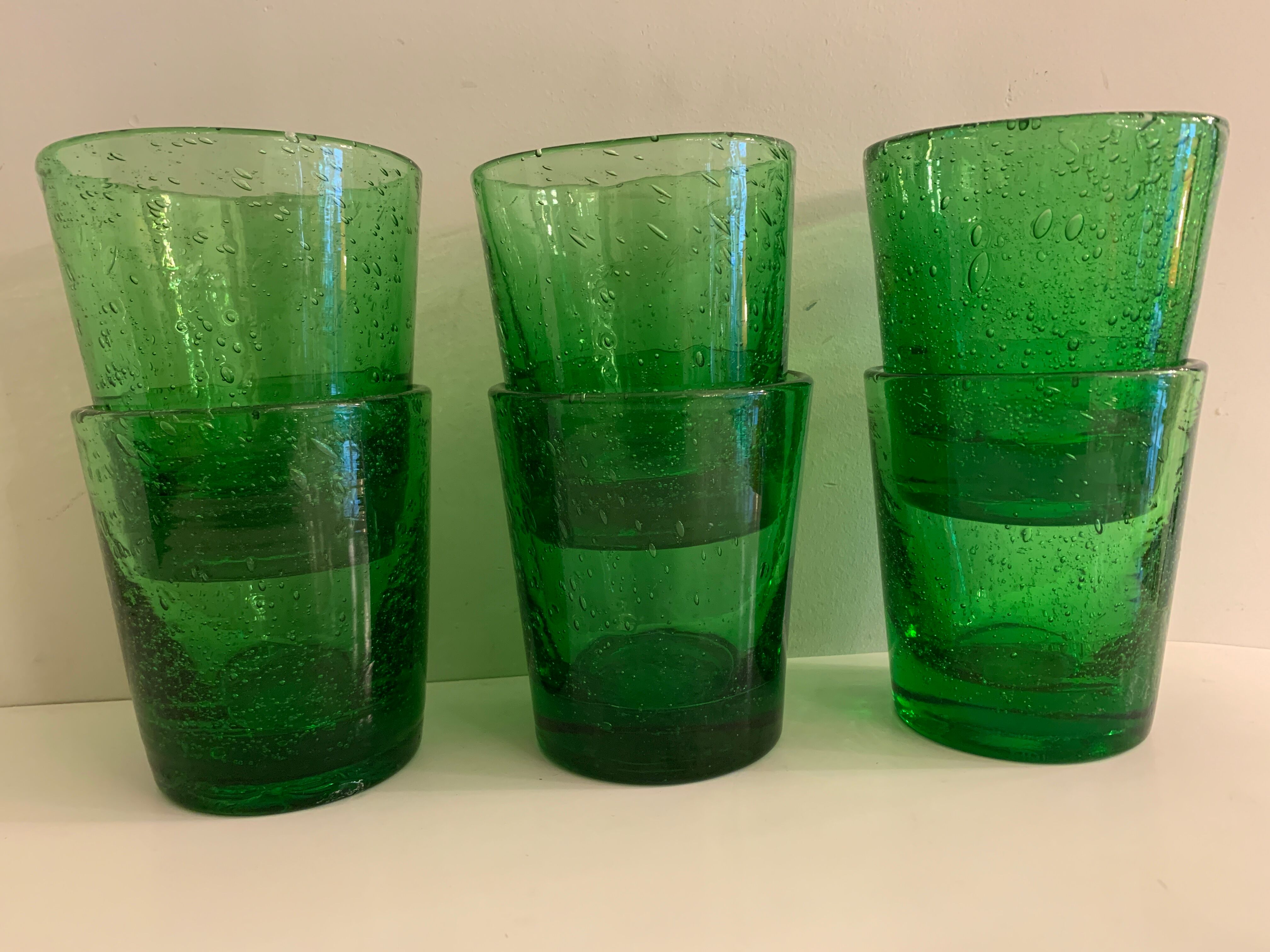 6 green whiskey glasses, bubbles and Biot soufflés